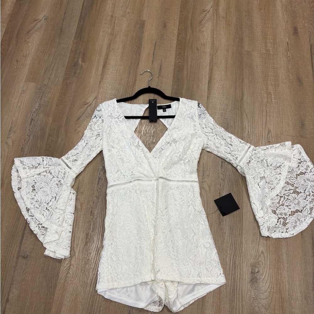 Elegant White Lace Romper with Bell Sleeves